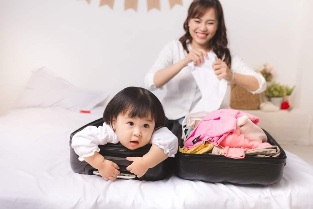 mengatasi-pilek-pada-bayi-liburan